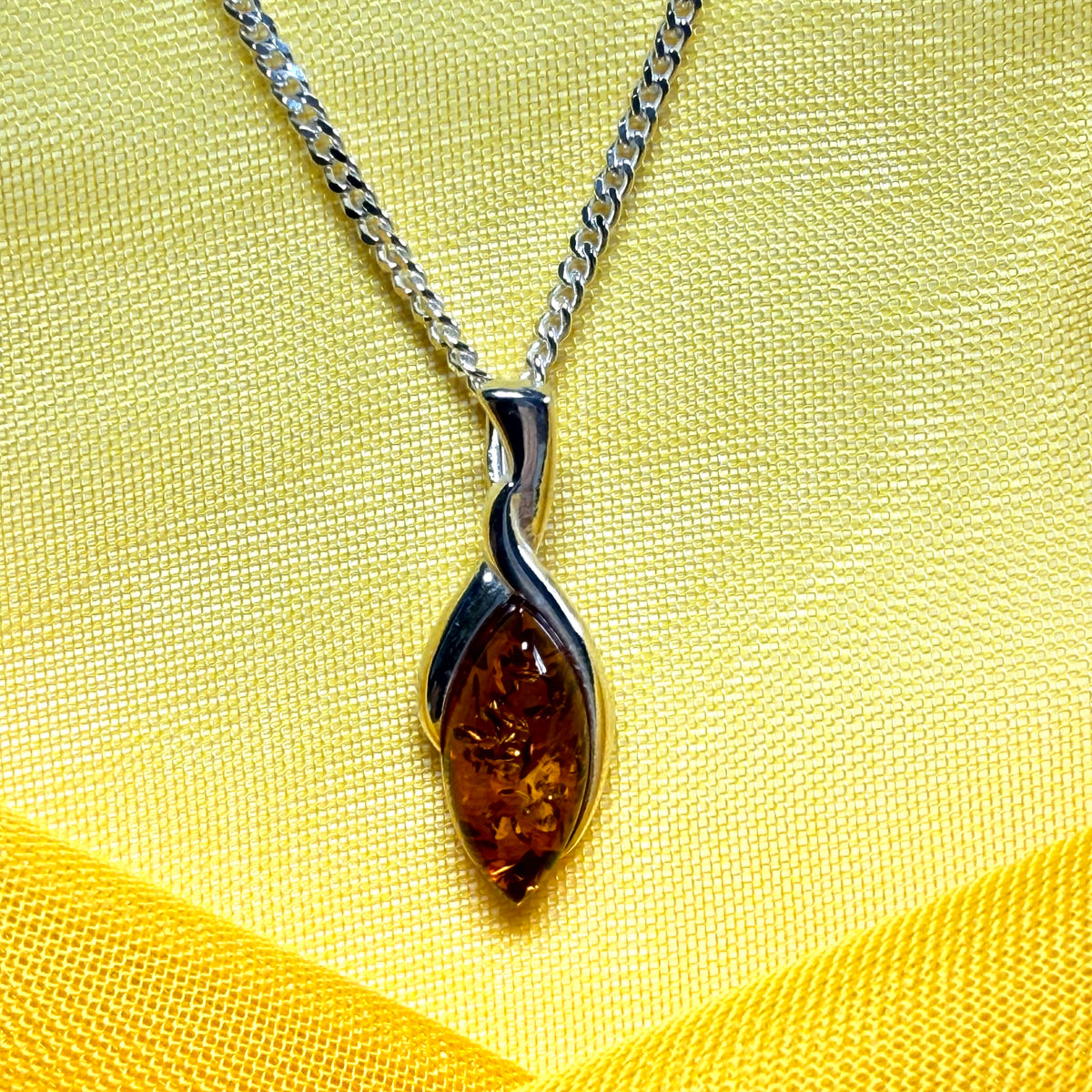 Sterling silver real amber marquise shaped necklace twisted marquise shaped pendant with a chain