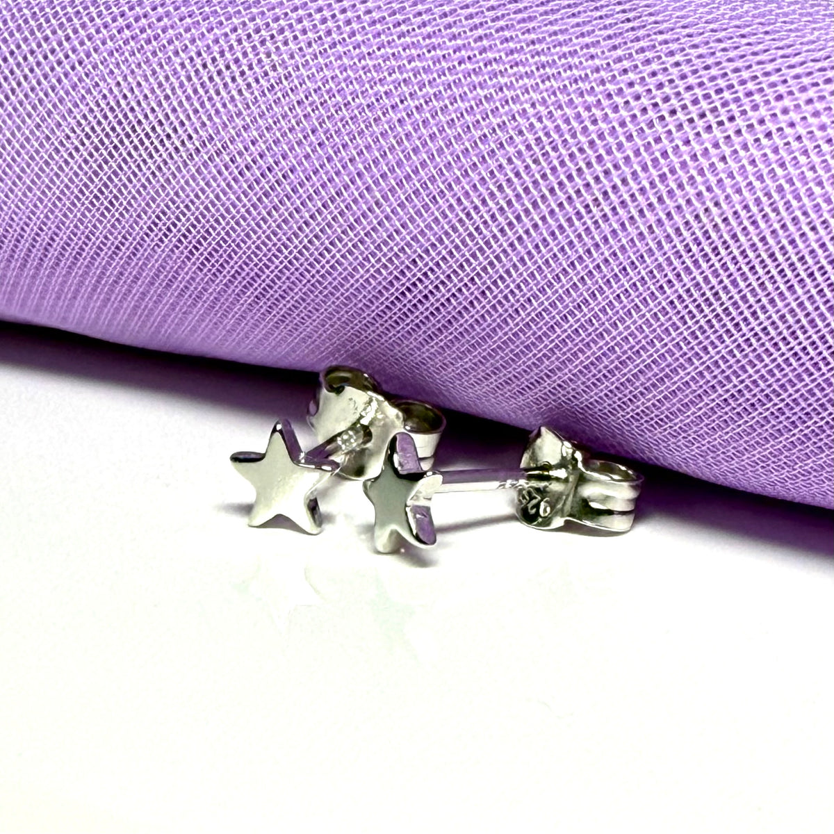 Sterling silver small star polished stud earrings