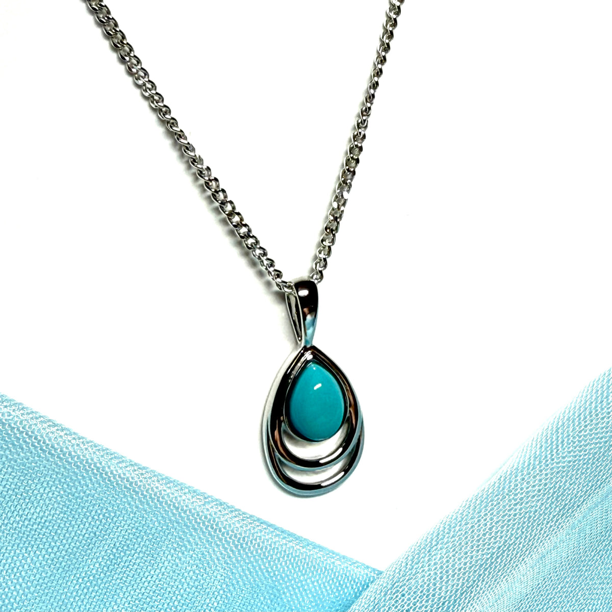 Sterling silver turquoise pear cut necklace open teardrop shaped pendant