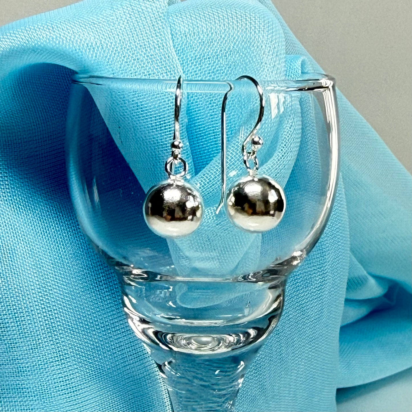 Sterling silver ball shaped drop earrings