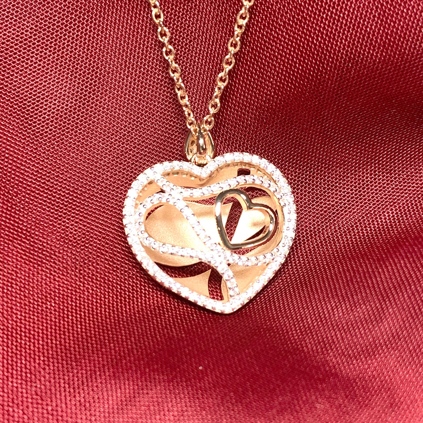 Sterling silver cubic zirconia heart necklace with rose gold giltSterling silver cubic zirconia heart necklace with rose gold gilt