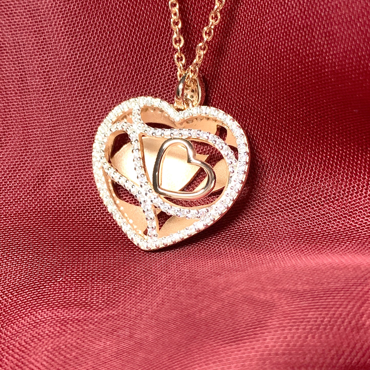 Sterling silver cubic zirconia heart necklace with rose gold gilt