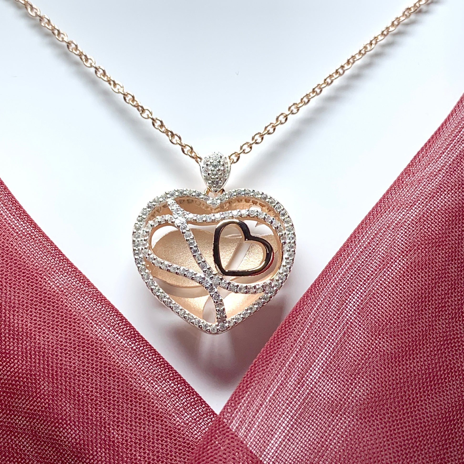 Sterling silver cubic zirconia heart necklace with rose gold gilt
