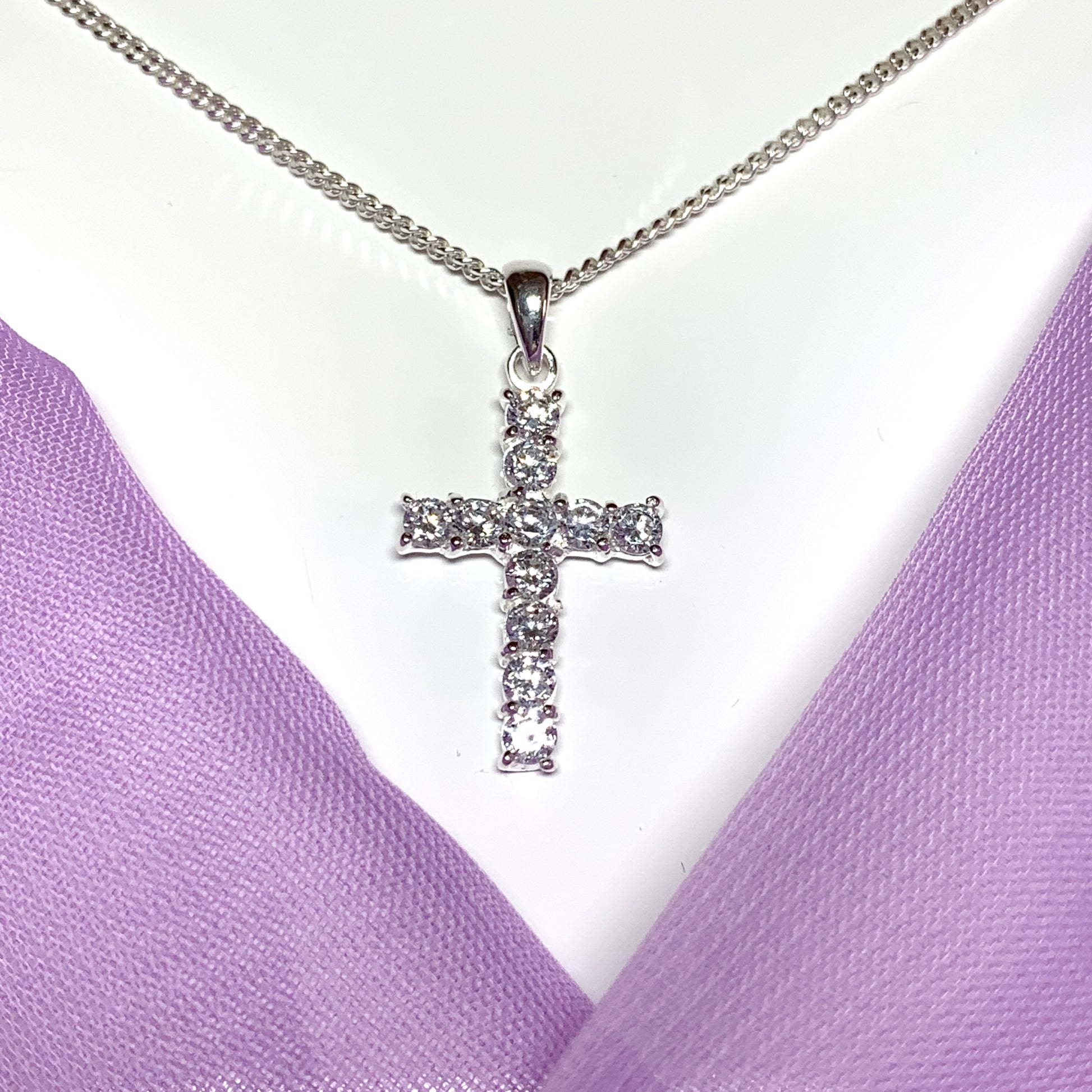 Sterling silver cubic zirconia set cross including chain