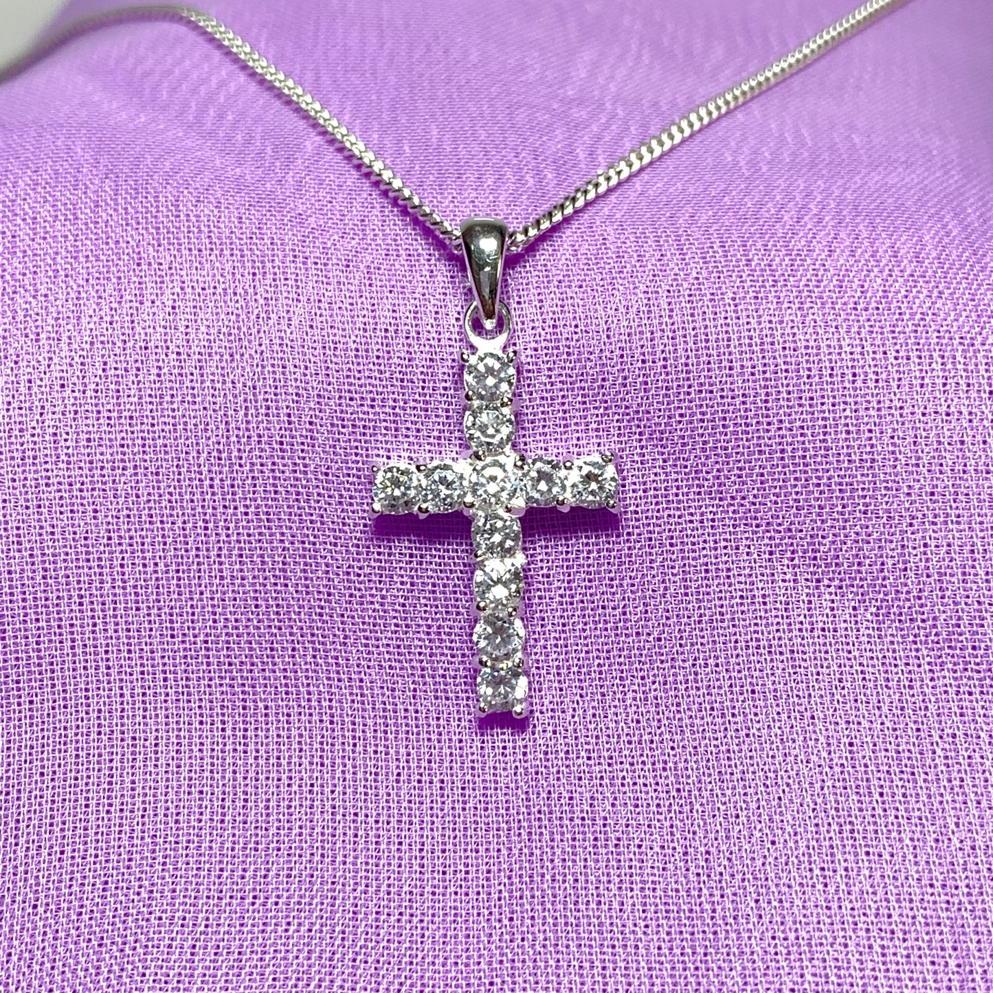 Sterling silver cubic zirconia set cross including chain