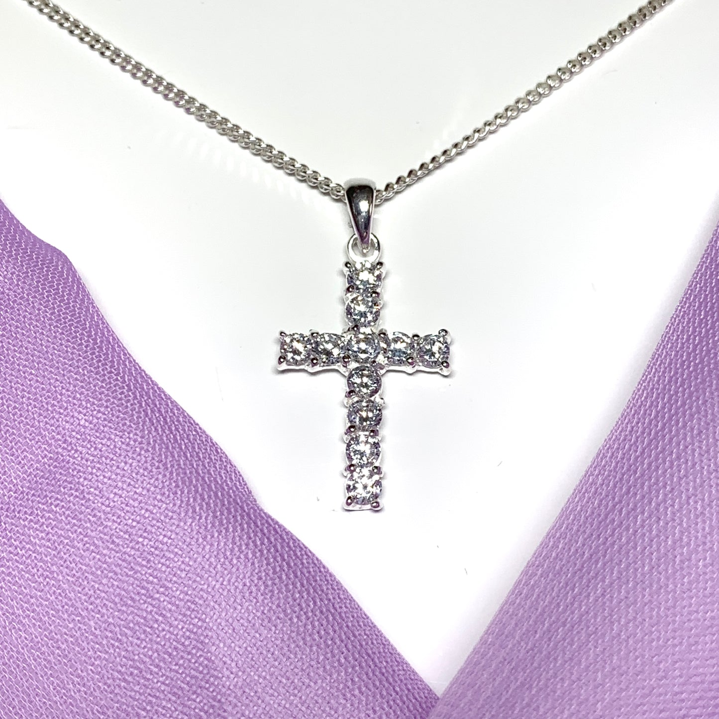 Sterling silver cubic zirconia set cross including chain