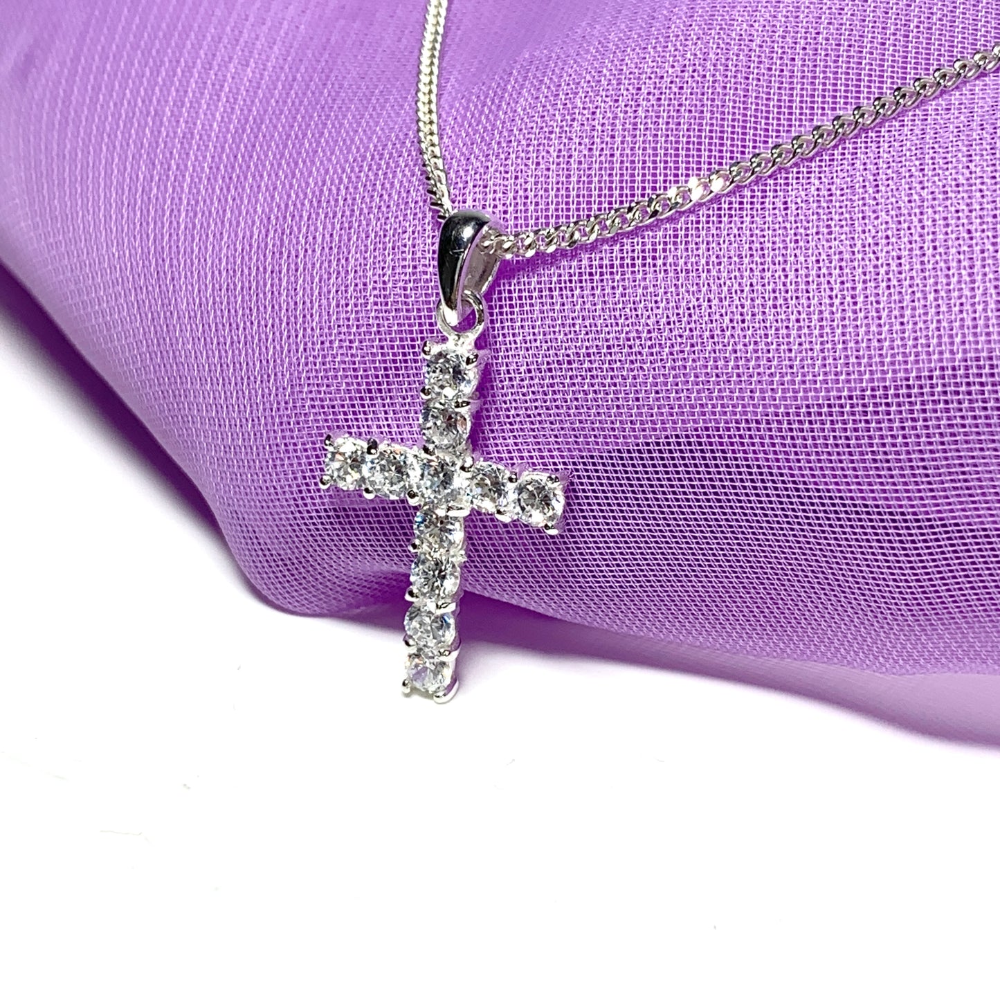 Sterling silver cubic zirconia set cross including chain