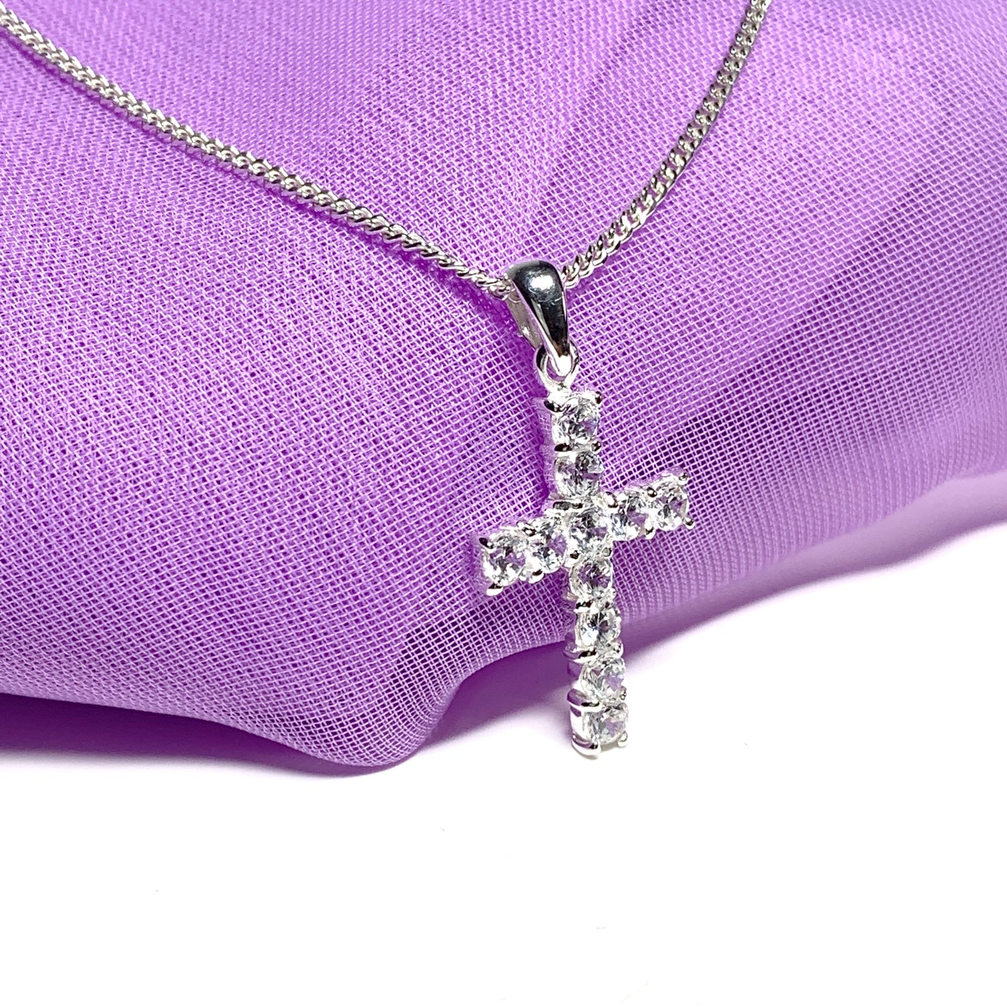 Sterling silver cubic zirconia set cross including chain