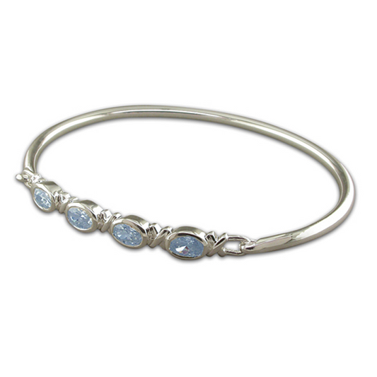 Sterling silver four oval blue topaz kiss bangle