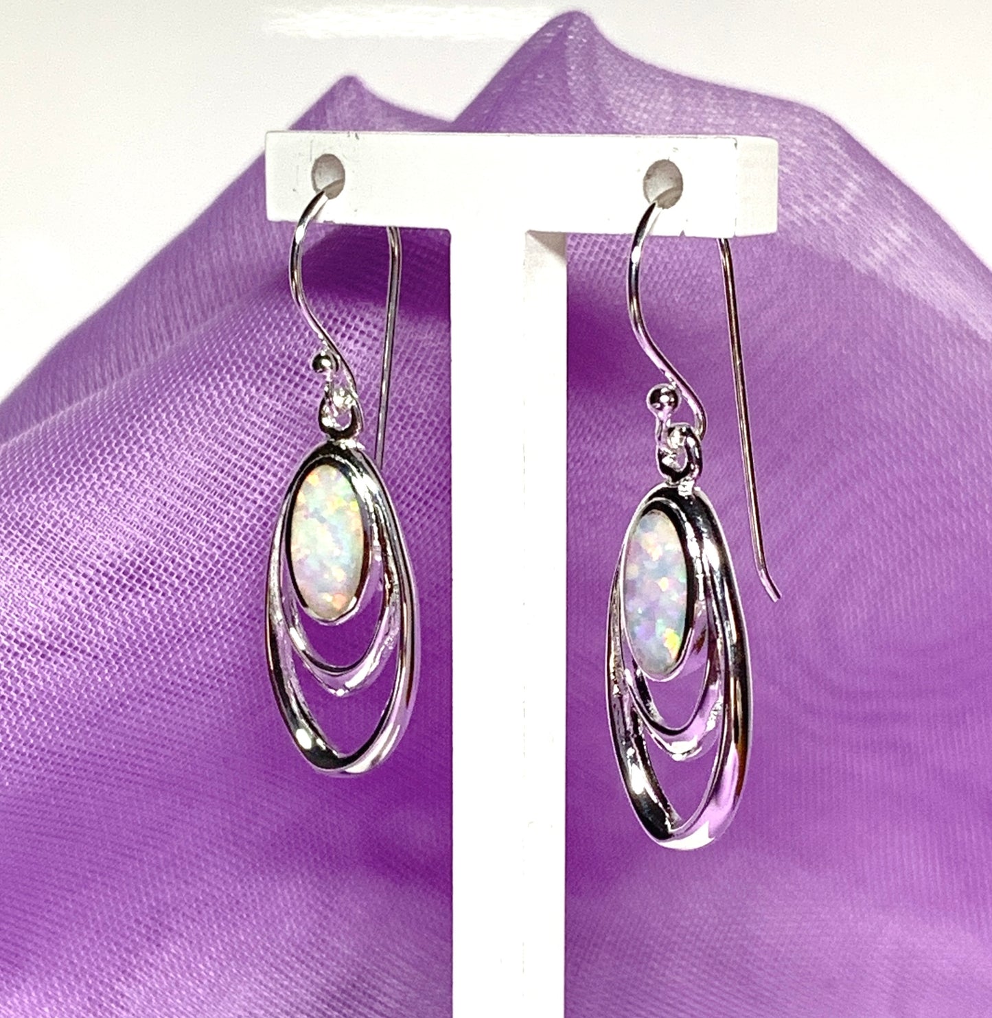 Sterling silver opal oval drop earrings