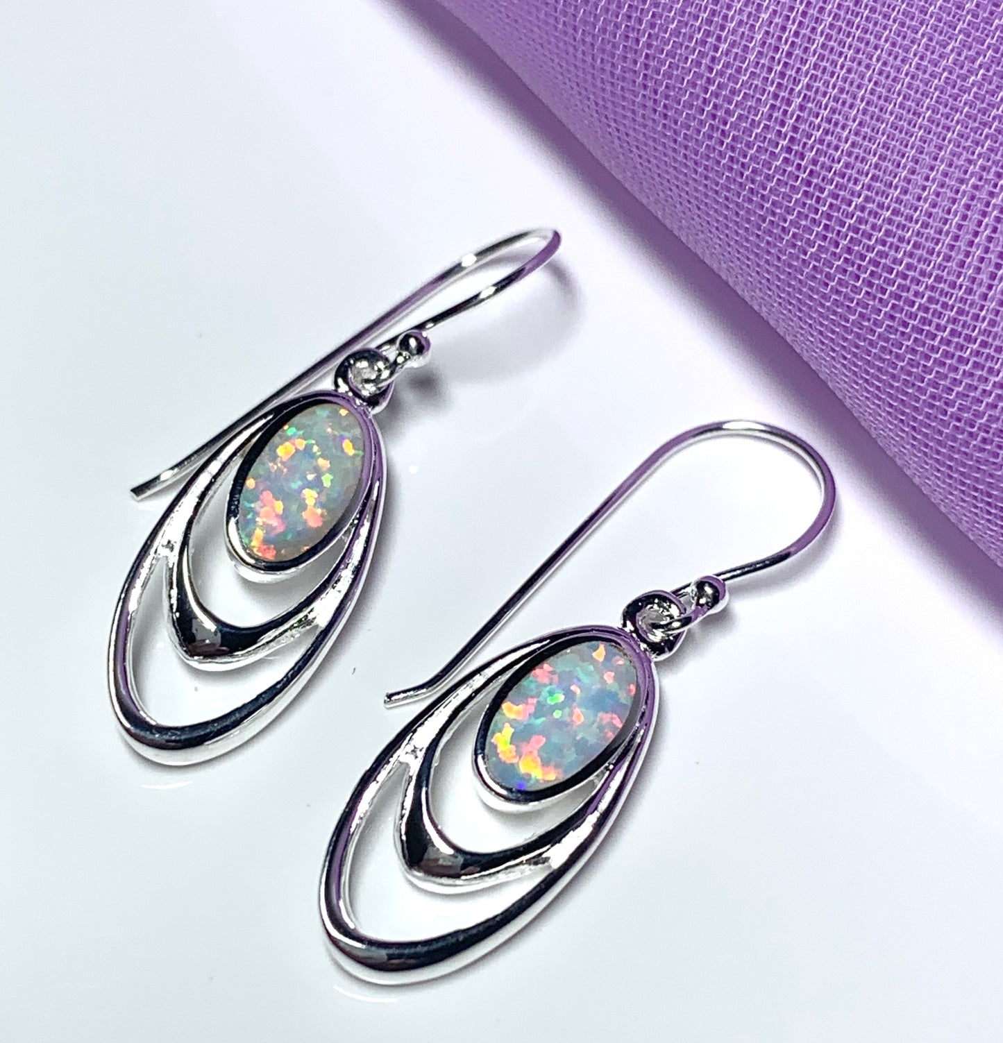 Sterling silver opal oval drop earrings