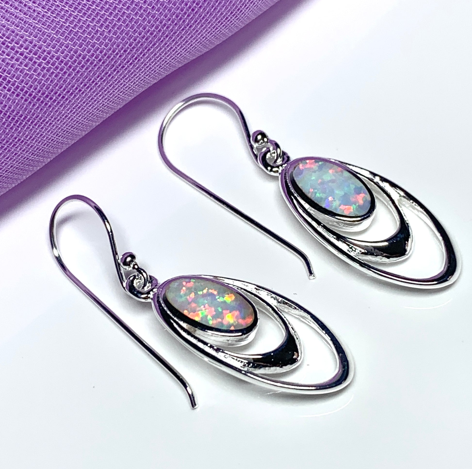 Sterling silver opal oval drop earrings