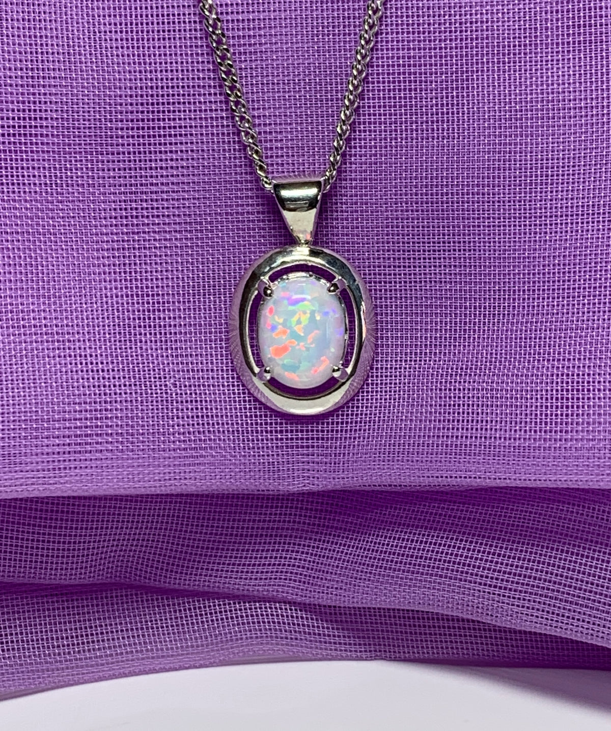 Sterling silver oval opal necklace halo