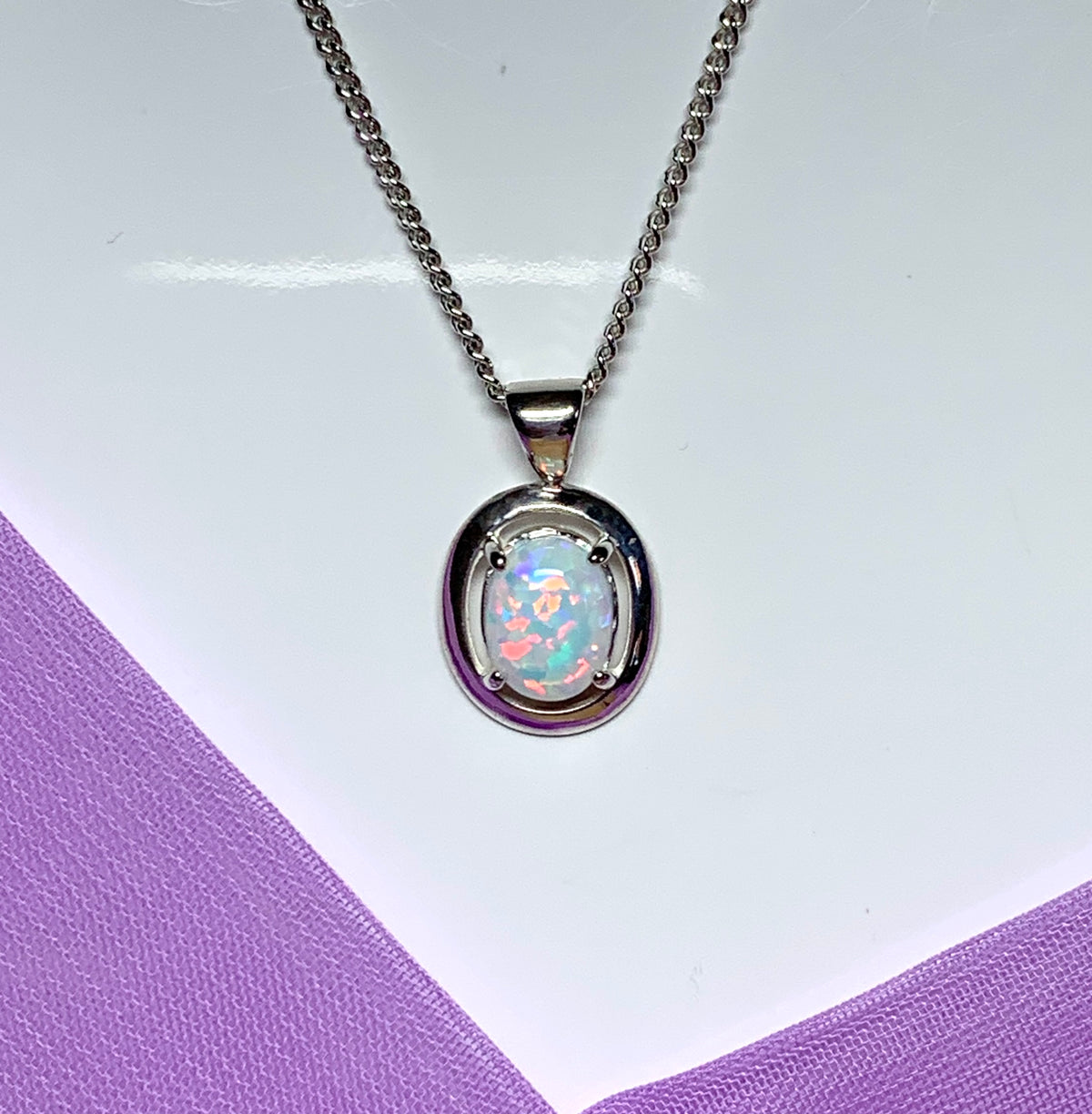Sterling silver oval opal necklace halo