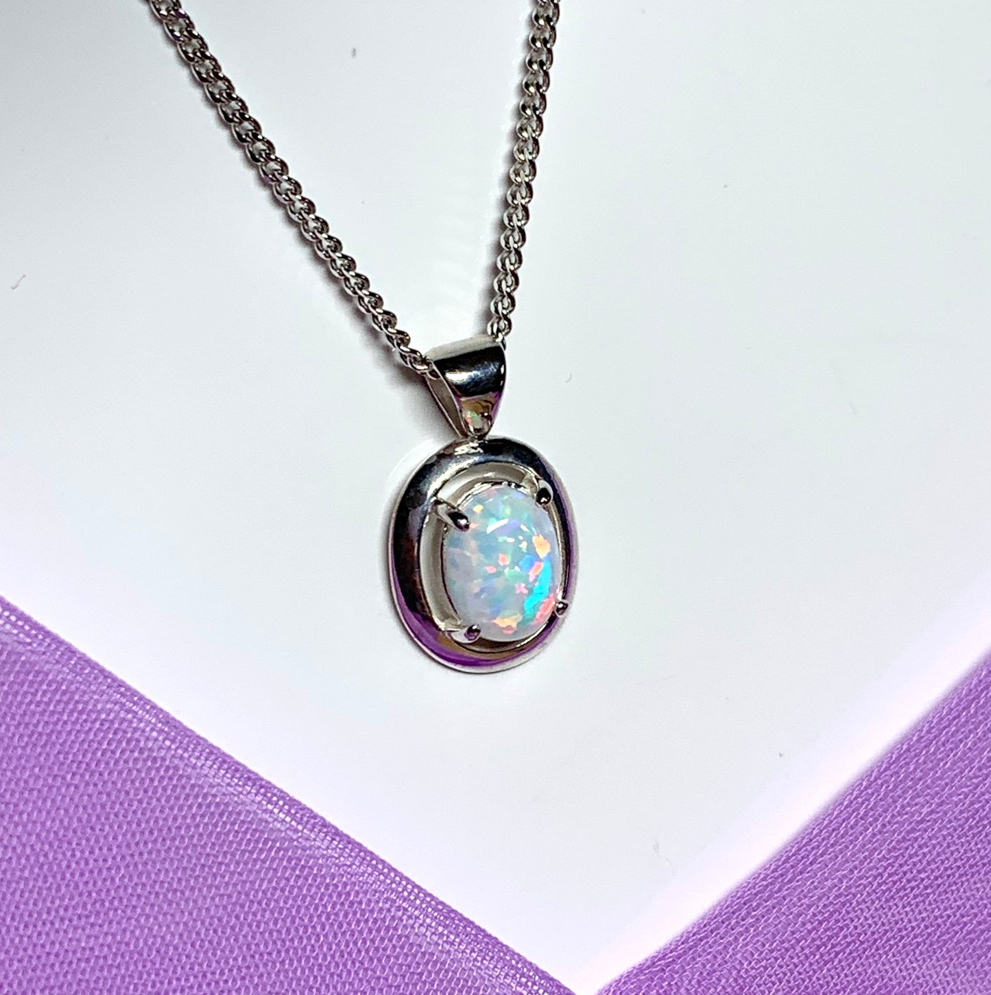 Sterling silver oval opal necklace halo