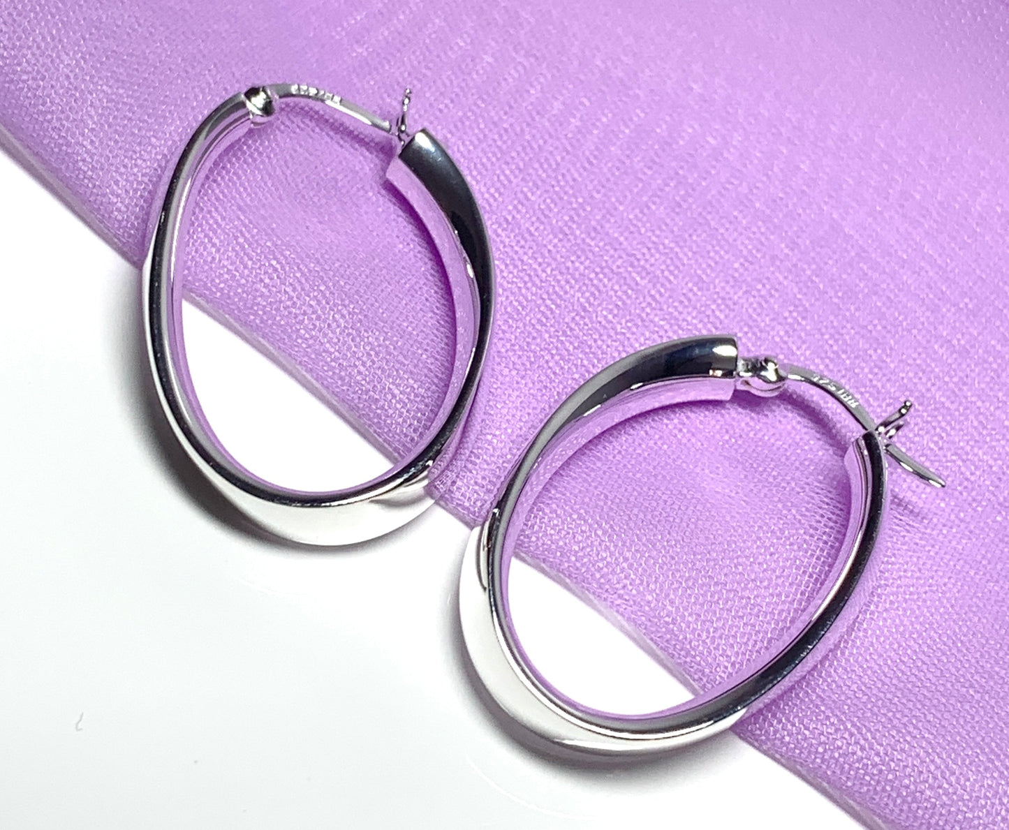 Sterling silver polished oval twisted hoop creole earrings