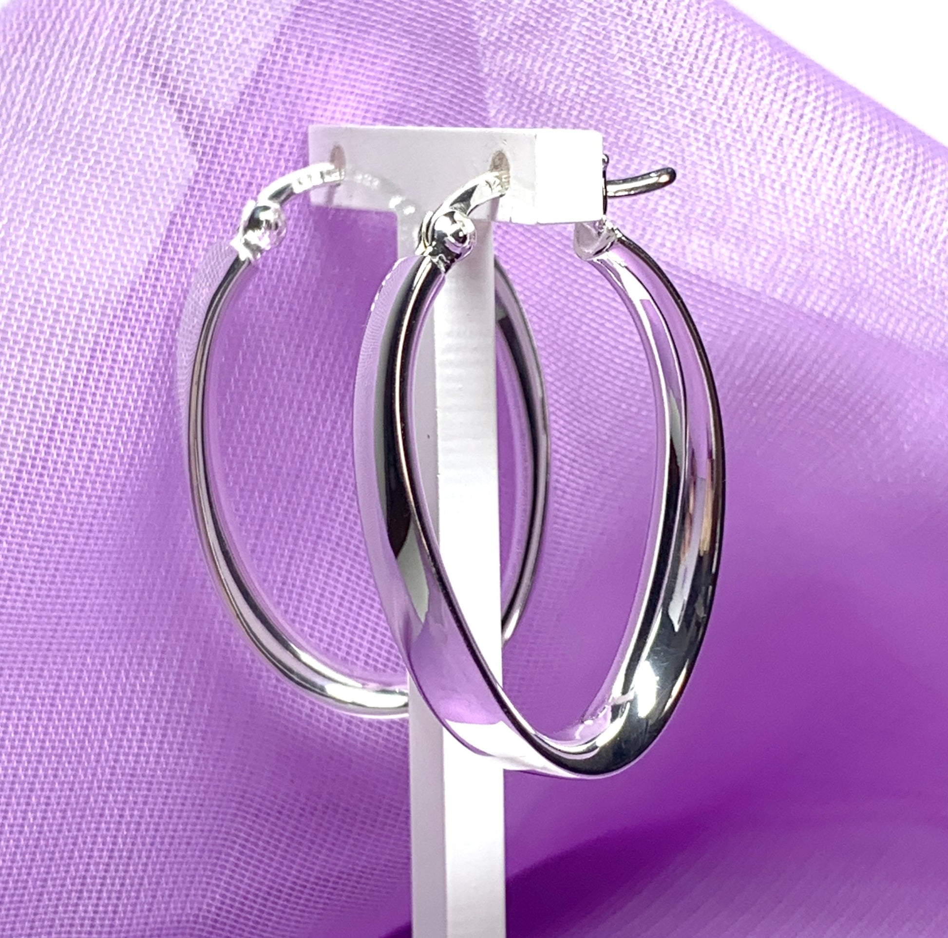 Sterling silver polished oval twisted hoop creole earrings