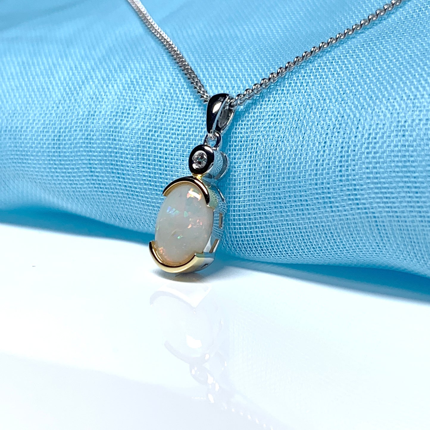Sterling silver real opal oval and cubic zirconia necklace pendent