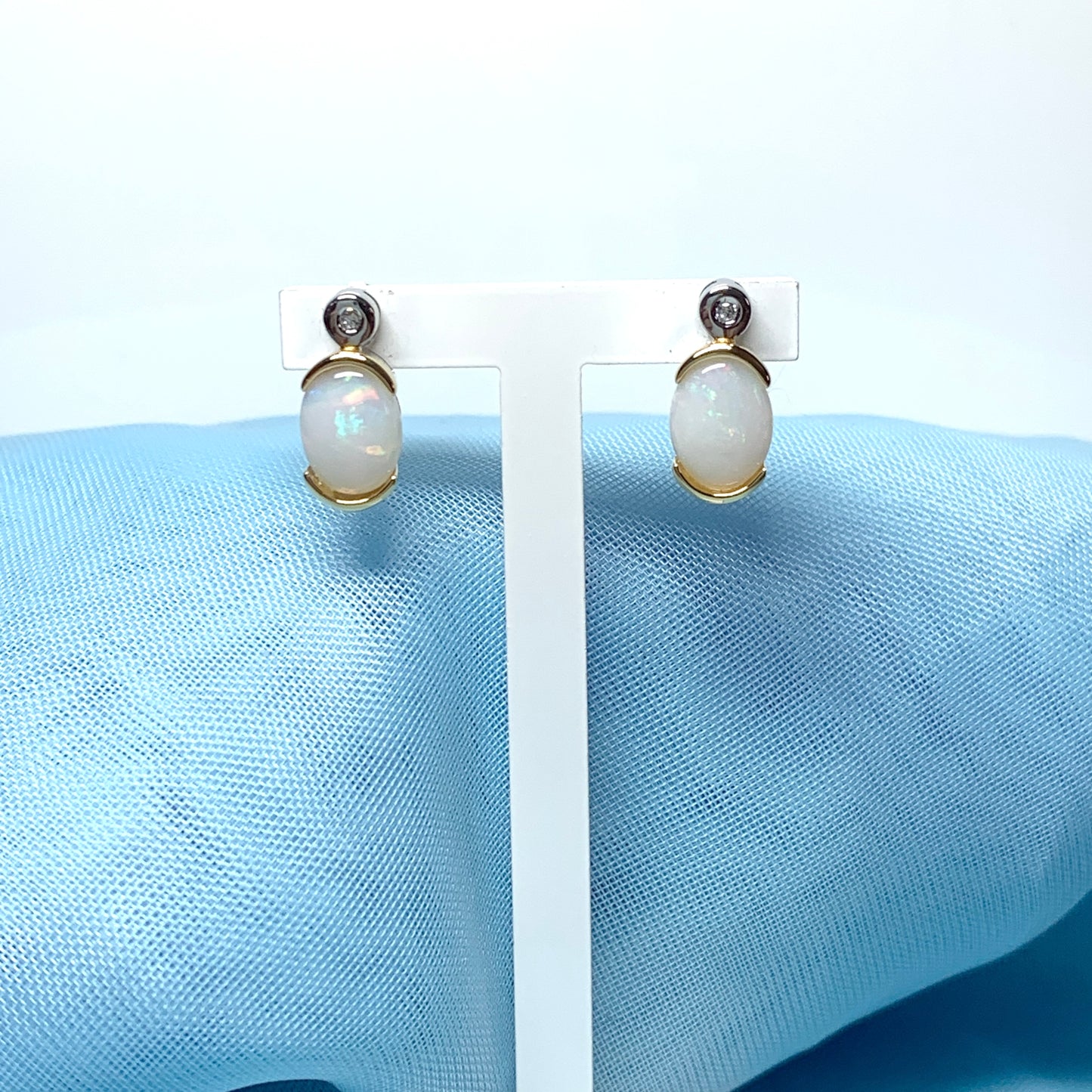 Sterling silver real opal oval and cubic zirconia stud earrings