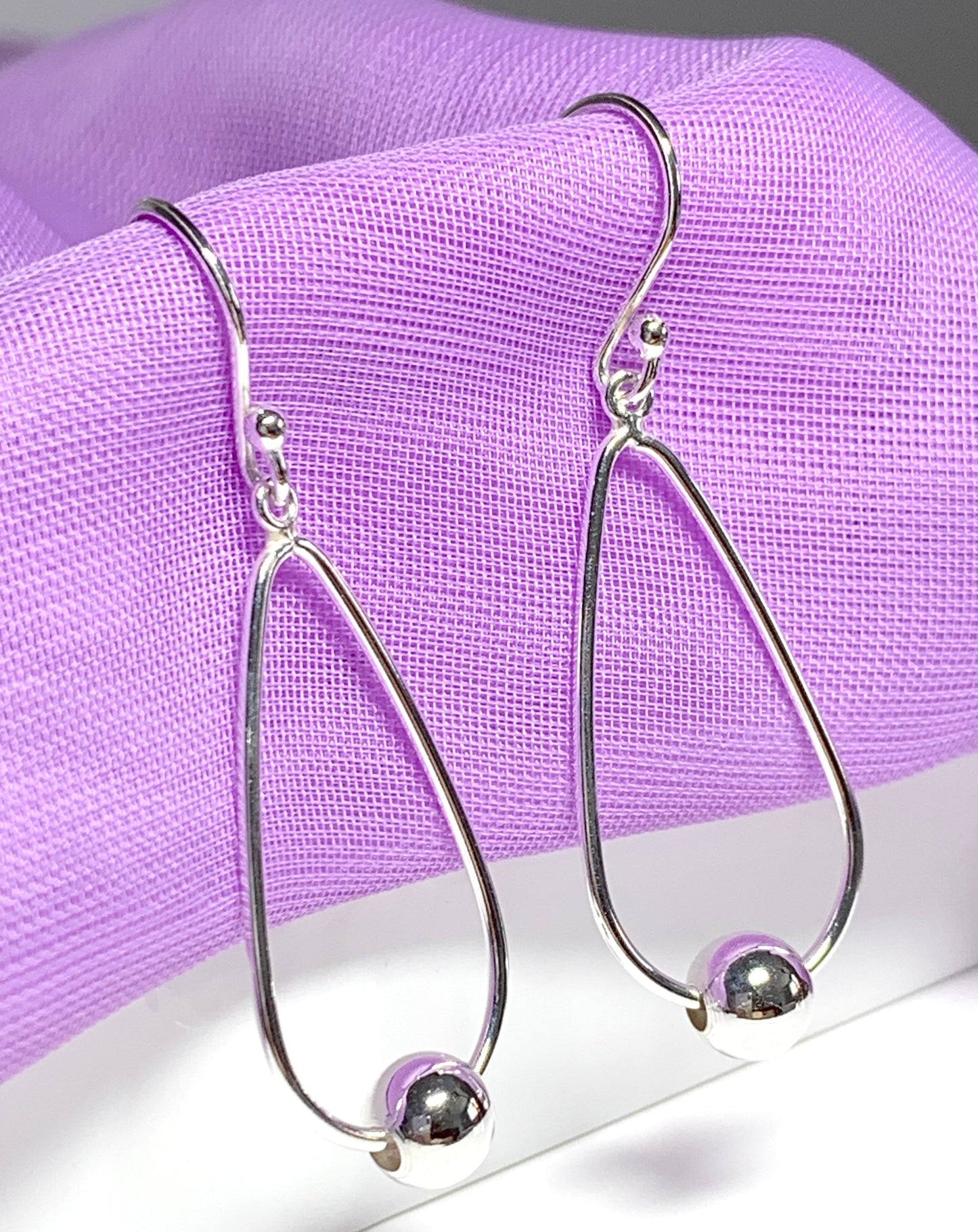 Sterling silver teardrop and ball shaped drop earrings