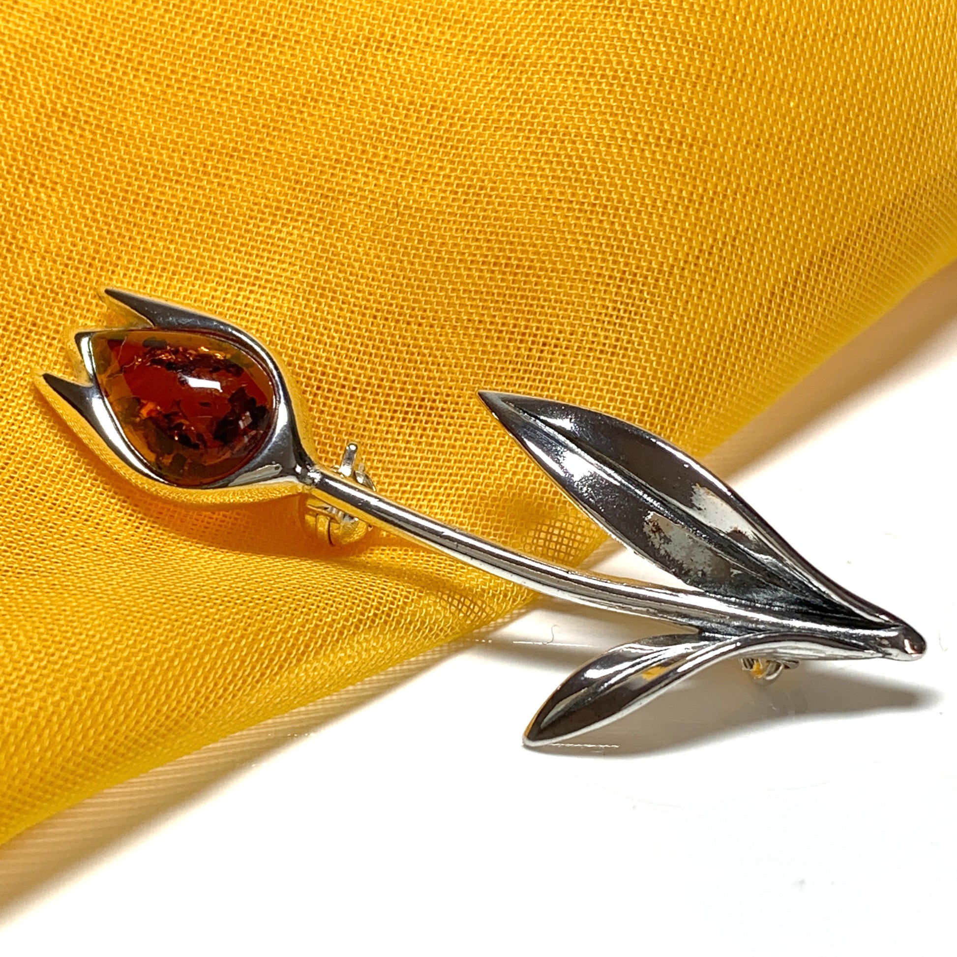 Sterling silver tulip amber brooch