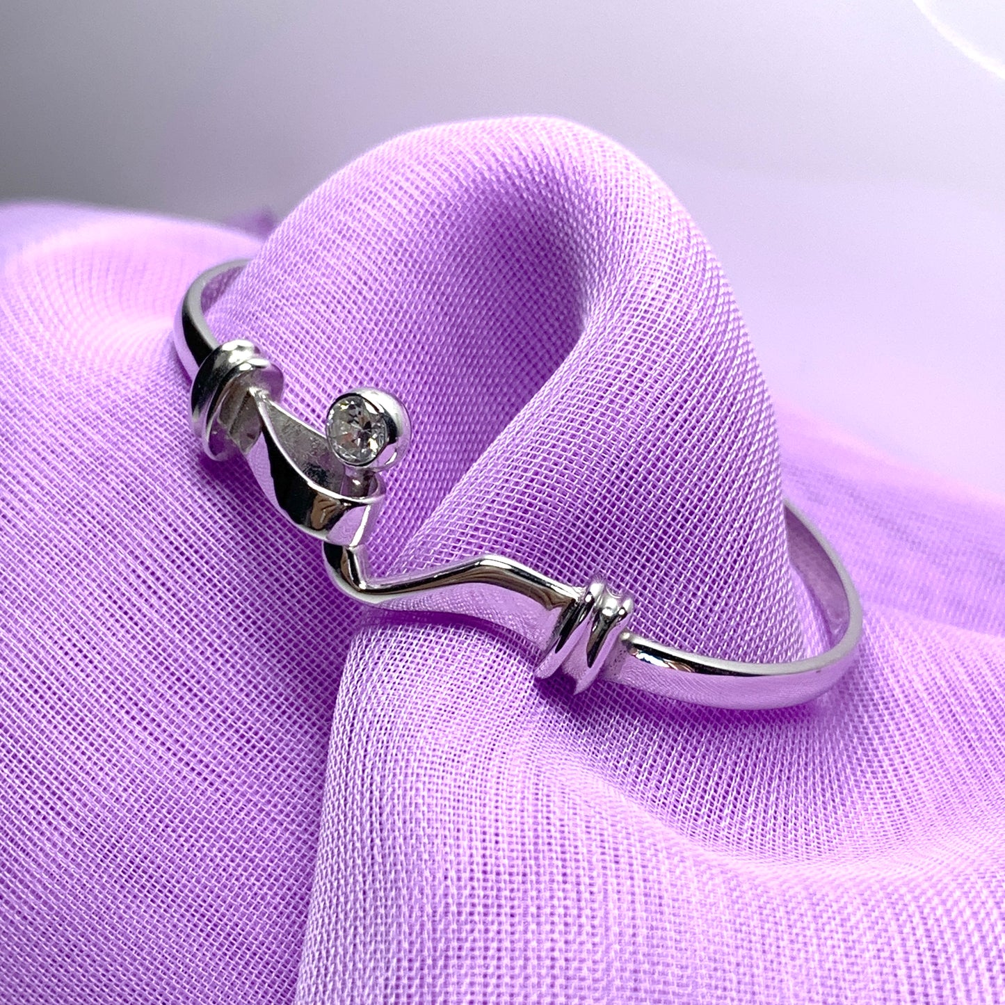 Stone set baby's sterling silver shepherds hook in ball loop bangle