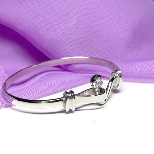 Stone set baby's sterling silver shepherds hook in ball loop bangle