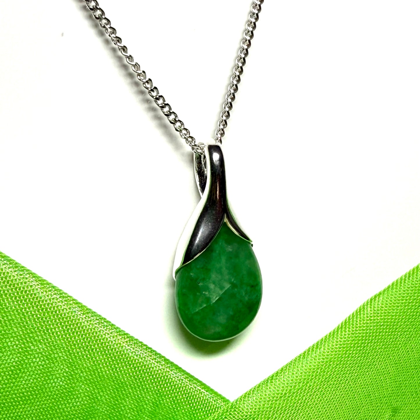 Stunning real green jade necklace with a teardrop or pear shaped pendant part