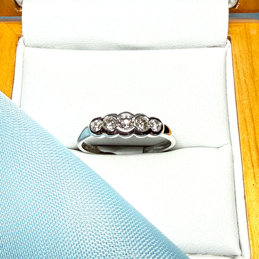 White gold round cut eternity ring diamond rubbed over setting 27 points