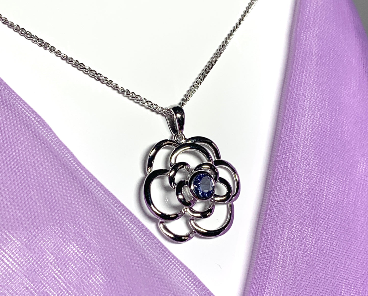 Real tanzanite round swirl necklace made in white gold