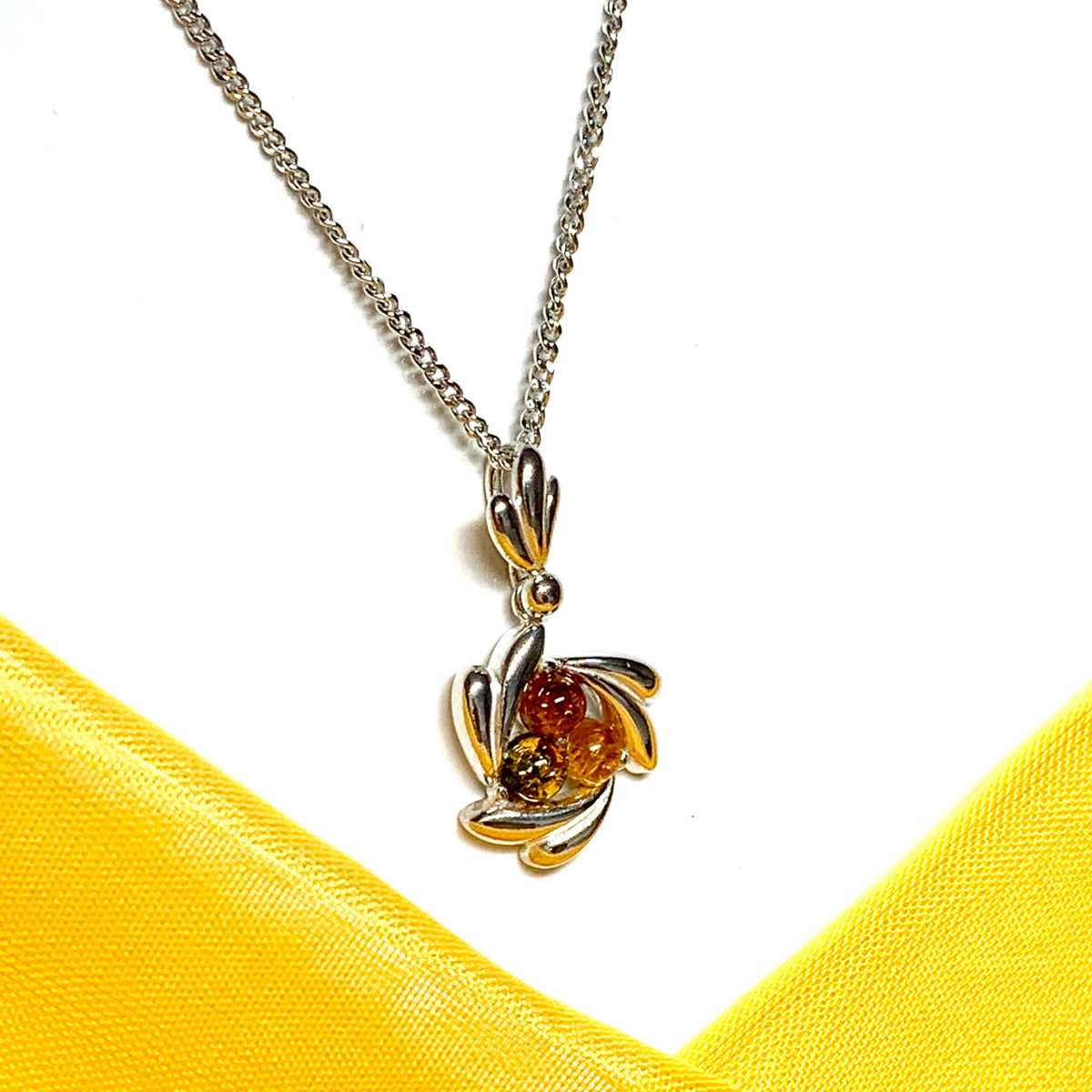 Swirl sterling silver multi coloured real amber necklace pendant