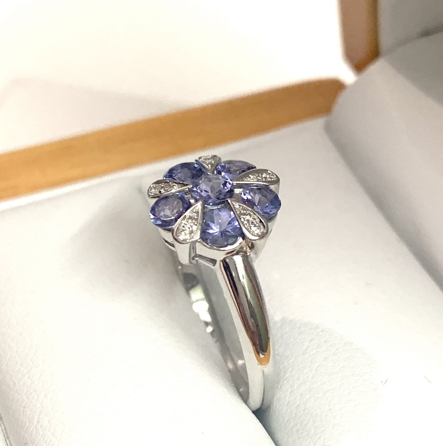 Real tanzanite and diamond ring fancy white gold cluster