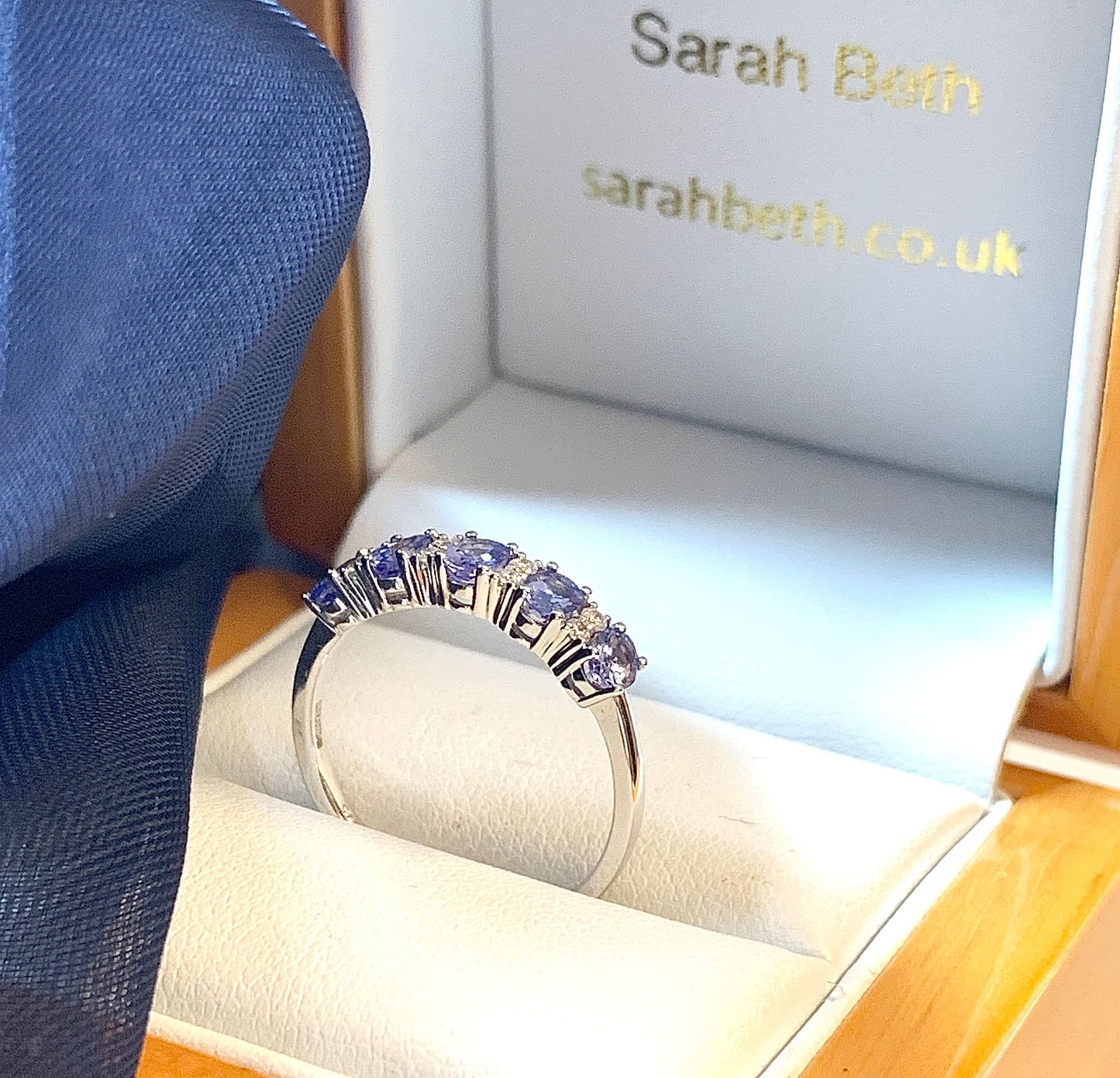 Tanzanite and diamond eternity ring