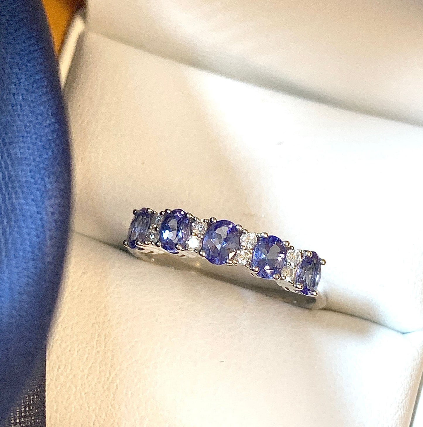 Tanzanite and diamond eternity ring