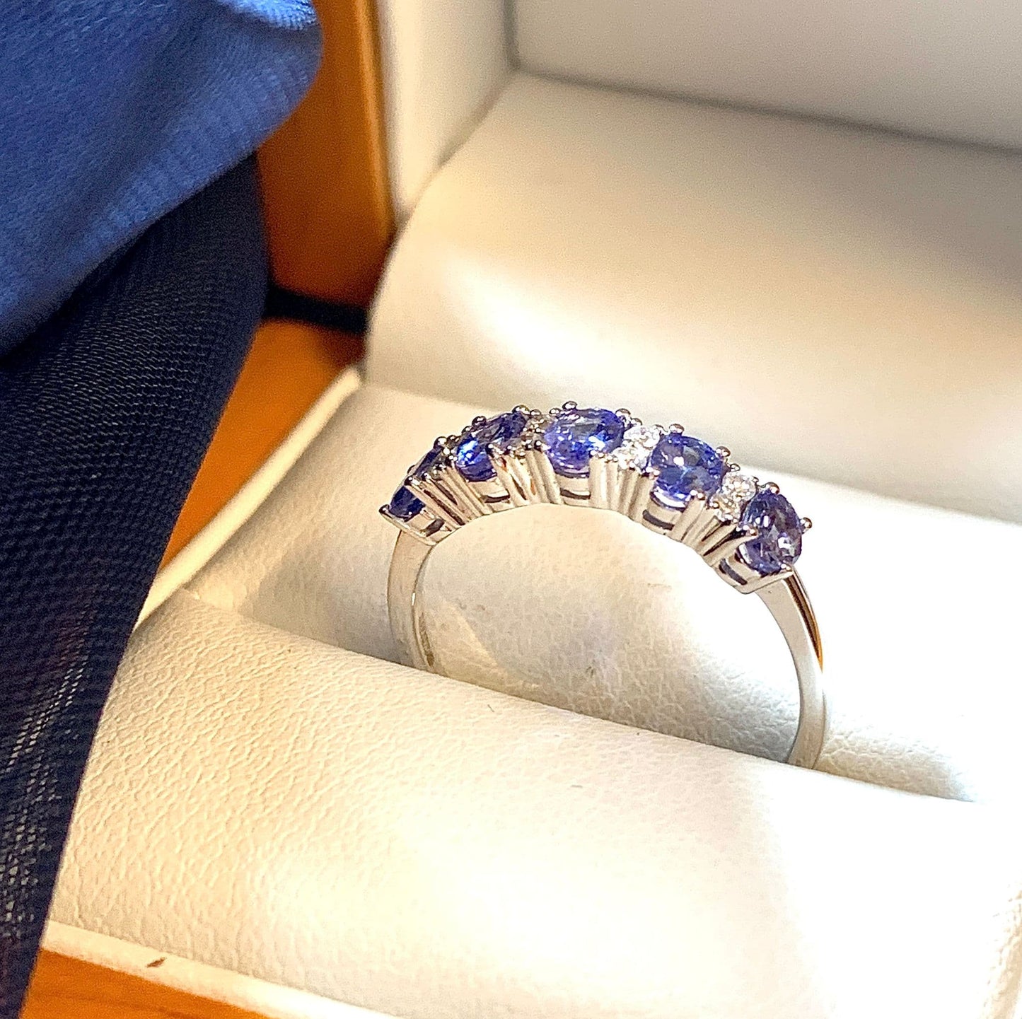 Tanzanite and diamond eternity ring