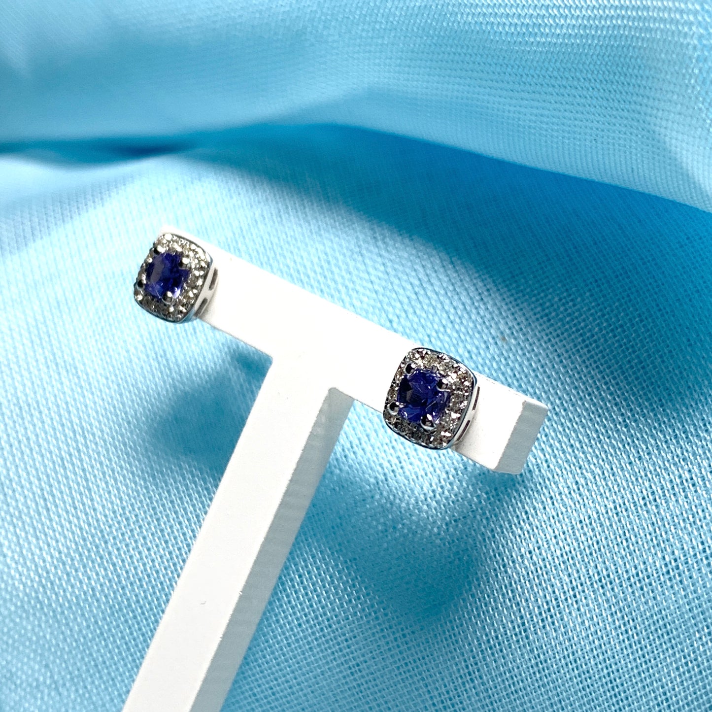 Tanzanite and diamond white gold cushion shaped stud earrings