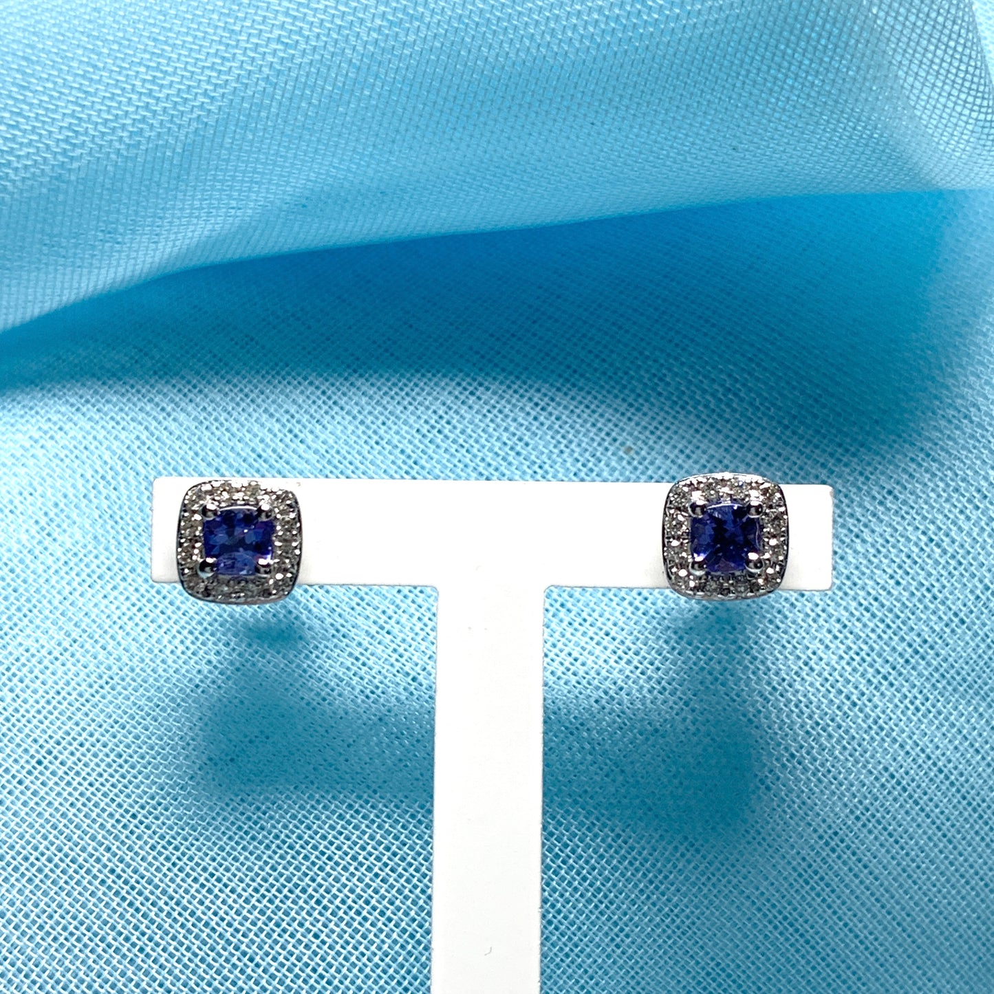 Tanzanite and diamond white gold cushion shaped stud earrings