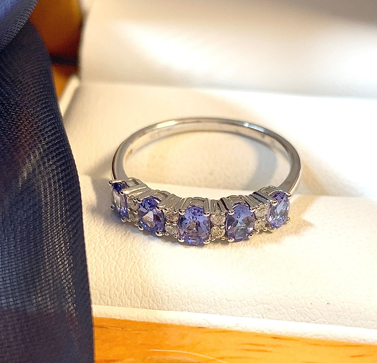 Tanzanite and diamond eternity ring