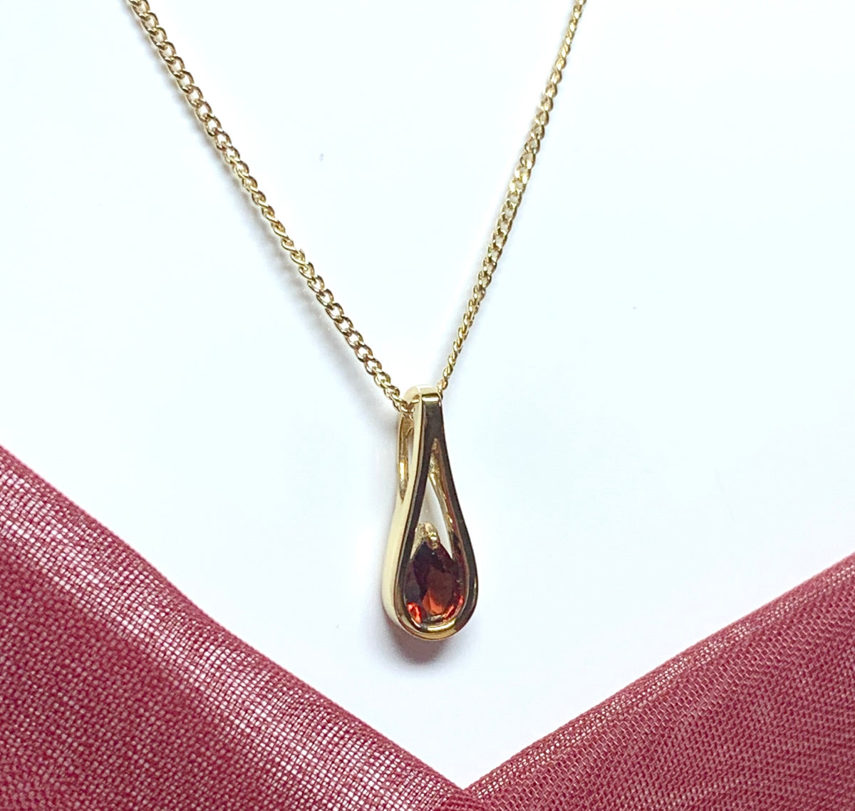 Tear drop pear real garnet necklace pendant yellow gold smooth rubbed over setting