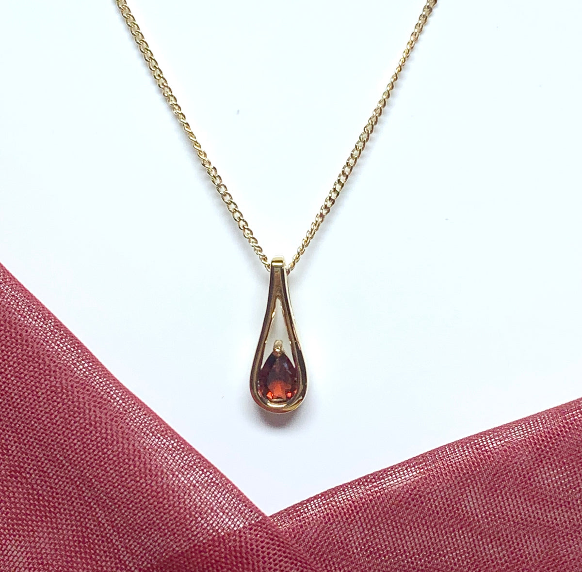 Tear drop pear real garnet necklace pendant yellow gold smooth rubbed over setting