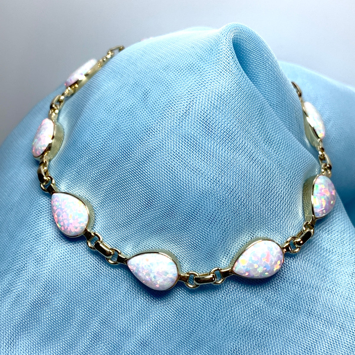 Teardrop opal yellow gold bracelet