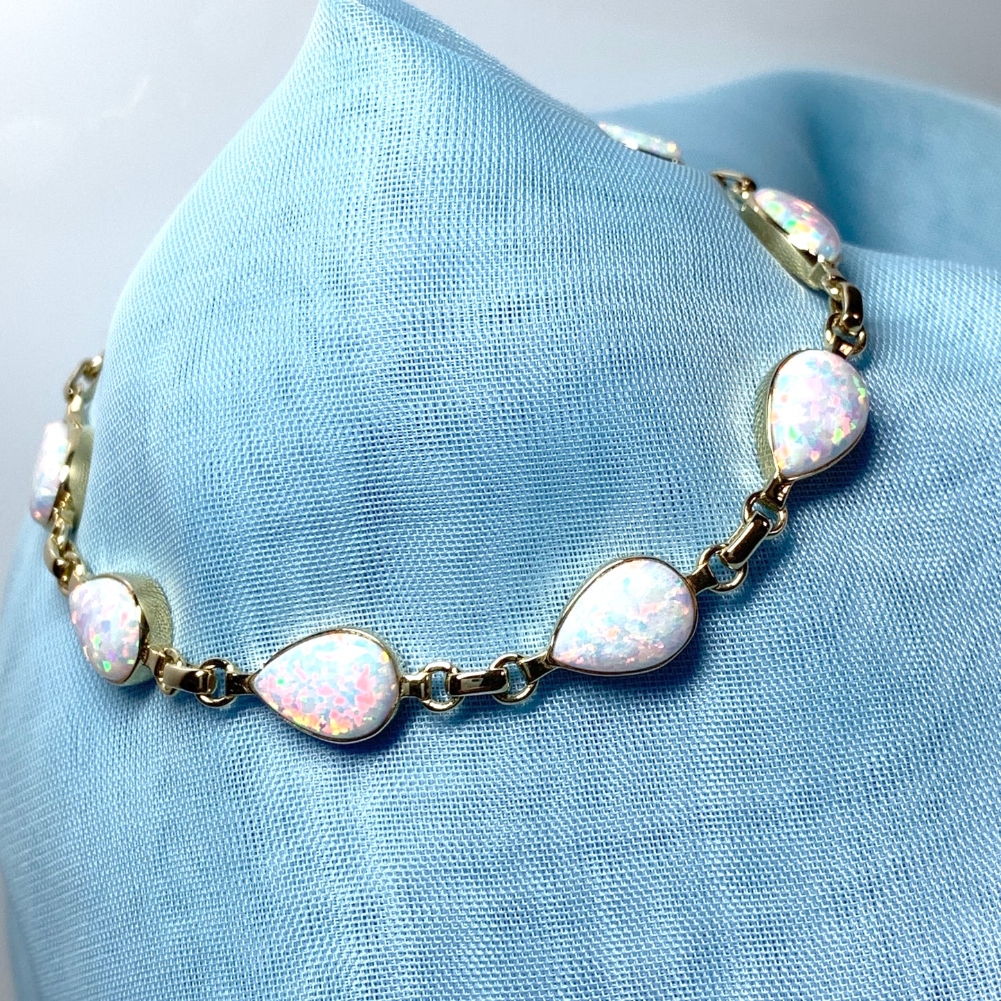 Teardrop opal yellow gold bracelet