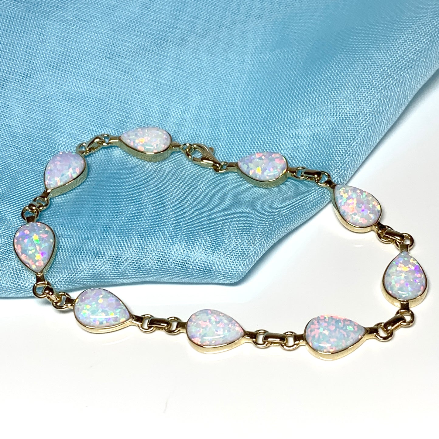 Teardrop opal yellow gold bracelet