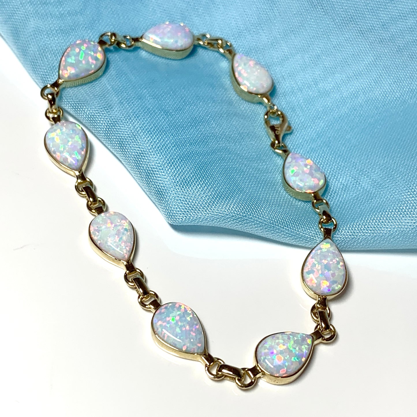 Teardrop opal yellow gold bracelet