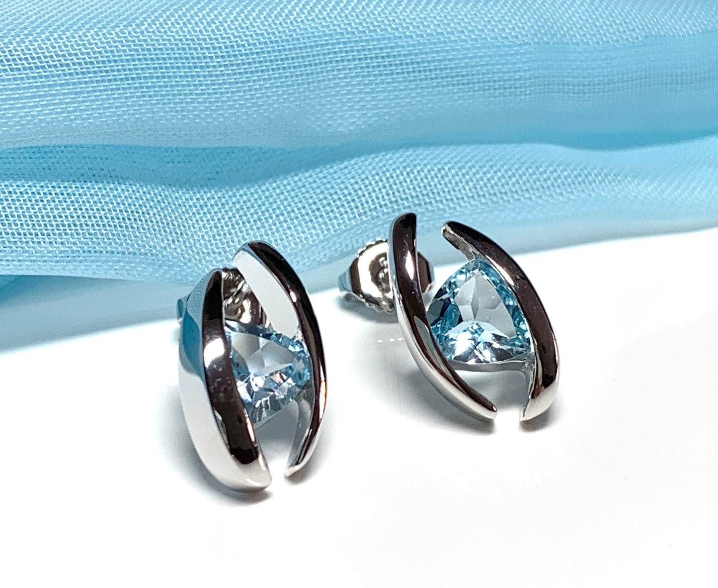 Triangle shaped sterling silver real light blue topaz fancy stud earrings