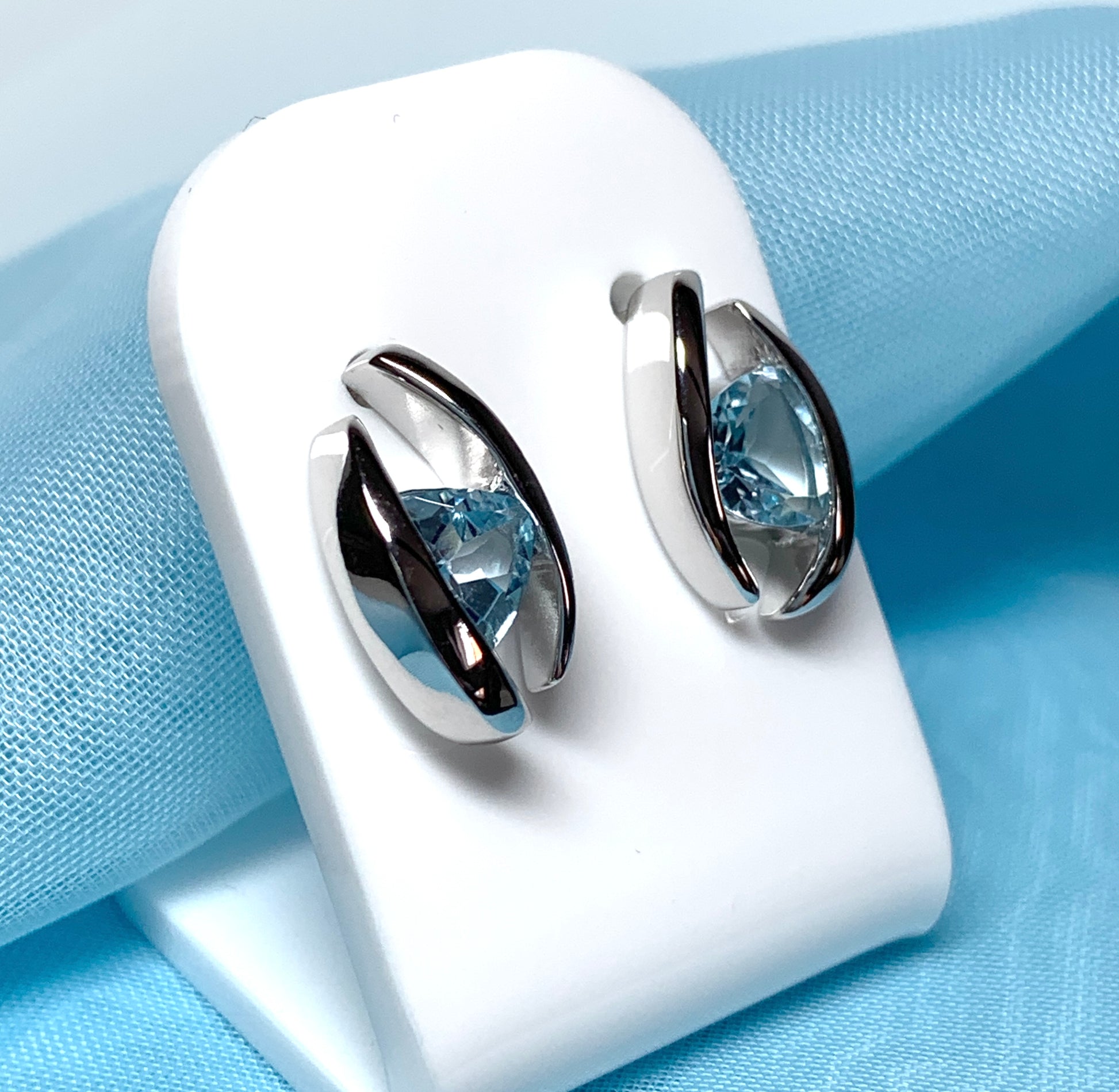 Triangle shaped sterling silver real light blue topaz fancy stud earrings