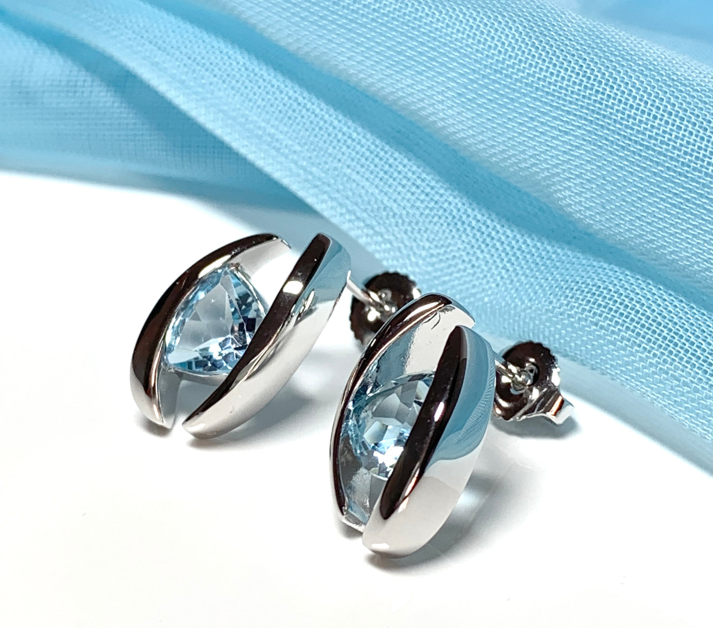 Triangle shaped sterling silver real light blue topaz fancy stud earrings