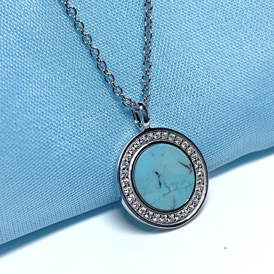 Turquoise and cubic zirconia round sterling silver necklace