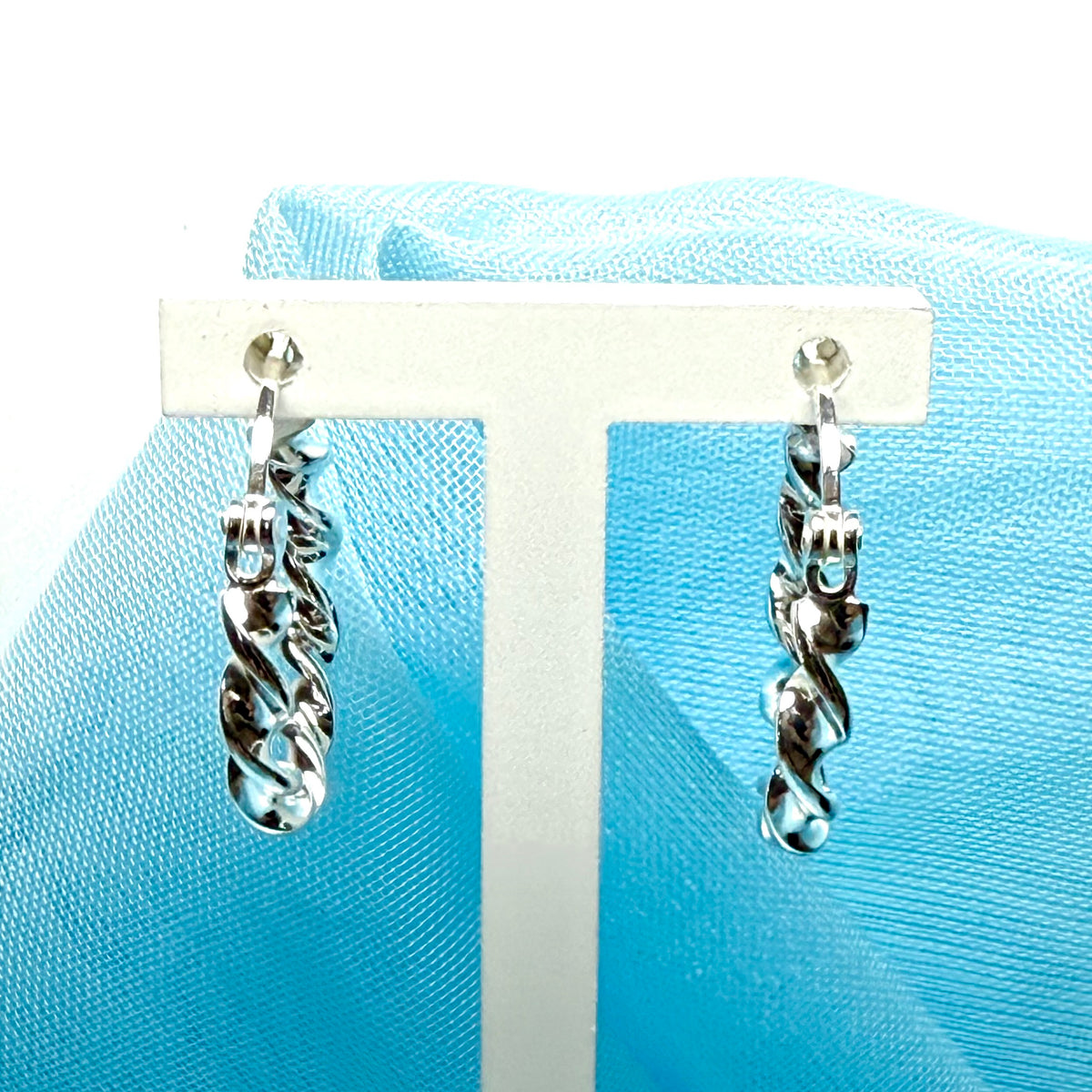 Twisted polished hoop earrings sterling silver round 17 mm