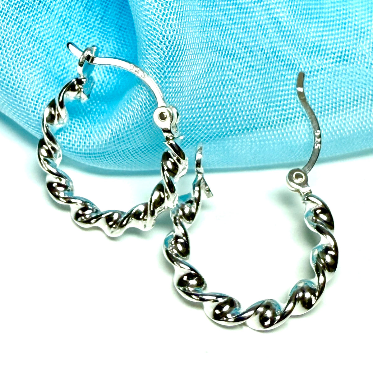 Twisted polished hoop earrings sterling silver round 17 mm